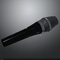 Sleek Handheld Microphone Electronic Device With Black Body Silver Mesh Grill And Metallic Ring