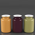 Colorful Ceramic Vessels in Orange Burgundy Sage Green with White Rimmed Tops and Cylindrical Design