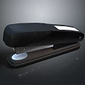Black Office Stapler With White Accent And Round Base For Workspace And Daily Use
