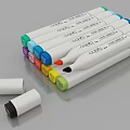 Colorful Marker Pens With White Body And Removable Caps Neatly Arranged On Gray Surface