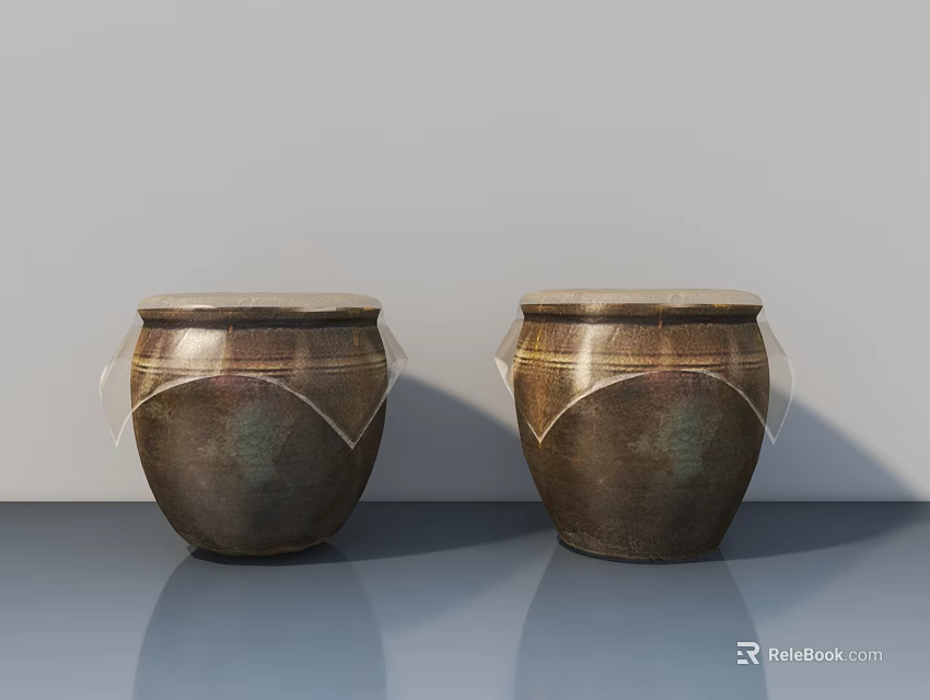 Decorative Ornament Set With Two Bronze Textured Drums On Glossy Table 3d model 