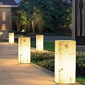 Outdoor Marble Column Light Glowing Softly With Natural Veins And Smooth Surface Design