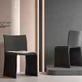 Modern Minimalist Dining Chairs With Sleek Design And Gray Wall Background 3d model