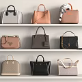 Stylish Handbags On White Shelves With Gray Peach Black Beige Structured Quilted Tote Designs