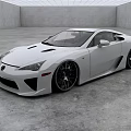 Stunning White Sports Car With Aerodynamic Body And Large Black Alloy Wheels