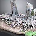 Wooden Stone Tree Stumps With Exposed Roots Green Foliage And Natural Base