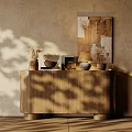 Wooden Console Table With Decorative Items And Artwork On Textured Wall