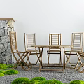 Outdoor Table With Wooden Folding Chairs Stone Wall And Green Moss