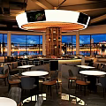 Restaurant Interior With Round Chandelier Bar Counter Tables And City View Through Windows