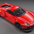 Red Sports Car with Sleek Aerodynamic Body Black Wheels and Front Fascia Design