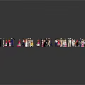 Miniature People Figurines Dressed In Various Costumes Gathered On Dark Surface