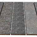 Garden Path Paving With Various Natural Stone Textured Surfaces In Gray Tones