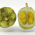 Fresh Ripe Whole And Halved Durian Fruit Showing Yellow Flesh Inside