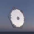 Hexagonal Illuminated Structure With Small Circular Dots And Central Hole Against Dusk Sky