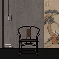 Traditional Chinese Armchair with Black Frame Rattan Seat by Wooden Wall and Traditional Pine Painting