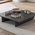 Modern Dark Wood Coffee Table With Books Decorative Bowl Glass Vase And Boxes On Rug