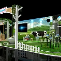 Welcome Themed Exhibition Booth With Green Background Cow And White Picket Fence