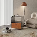 Modern Bedside Table With Glass Top Wooden Drawer And Floor Lamp Near Sofa