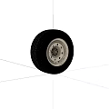 Black Vehicle Tire With Silver Metal Rim And Detailed Tread Pattern On Dark Background