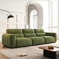 Green Tufted Three Seater Sofa in Modern Living Room with Floor Lamp and Coffee Table