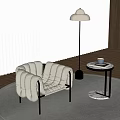 Beige Tufted Accent Chair With Metal Legs And Gold Floor Lamp In Modern Living Room