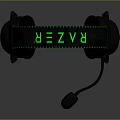 Computer Gaming Headphones With Black Ear Cups Green Headband And Microphone