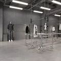 Modern Industrial Style Clothing Store With Cozy Lounge And Sleek Cement Interior Design