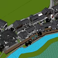 Traditional Commercial Street With Classic Black Tile Roofs River And Green Landscaping