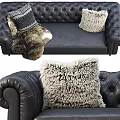 Luxurious Black Leather Three-Seater Sofa With Tufted Design Decorative Pillows And Fur Throw