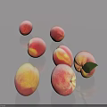 Fresh Pink And Yellow Peaches With Green Leaves On Smooth Gray Surface
