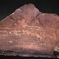 Ancient Red Rock With Petroglyphs And Wooden Accents In Natural Historical