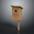 Rustic Wooden Birdhouse With Sloped Roof Small Entry Hole And Wooden Pole Base