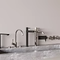 Modern Kitchen Sink Faucets With Sleek Metal Design On Stone Countertop