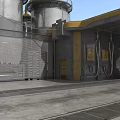 Industrial Facility With Large Storage Tanks Yellow Tops Metal Towers Fencing Solar Panels And Equipment