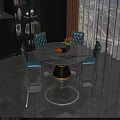 Elegant Modern Dining Table Set With Round Marble Top Black Base And Blue Tufted Chairs