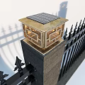 Building Exterior Wall Featuring Black Iron Gate And Stone Pillars With Golden Tops