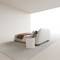 Modern White Upholstered Double Bed With Decorative Pillows And Nightstands