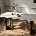 Modern Grey Dining Table With Unique Wooden Metal Legs And Decorative Items On Wooden Floor