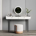 Elegant Dressing Table With White Countertop Black Legs Round Mirror Cosmetics Green Plant And Stool