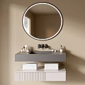 Modern Bathroom Vanity Cabinet with Round Mirror Gray Countertop and White Towels