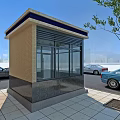 Modern Glass Storefront With Yellow Brick Wall Gray Base And Trees On Sidewalk