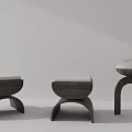 Three Modern Wooden Stools With Upholstered Seats And Unique Curved Leg Designs
