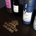 Luxury Wine Bottle And Glasses With Decorative Colored Boxes On Wooden Table