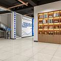 Spacious Government Service Hall Interior With Blue Backdrop Green Logo And Potted Plants