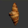 Golden Flaky Freshly Baked Croissant With Crispy Layers On Dark Reflective Surface