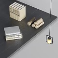 Neatly Stacked Books And Magazines On Dark Wooden Table With Scrolls And Hanging Lamp