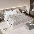Modern Double Bed with Beige Upholstered Headboard Gray Quilt Ottoman Magazines and Wooden Floor Rug