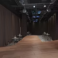 Modern Indoor Space With Dark Curtains Wooden Flooring Rows Of Tables Chairs And Ceiling Screens