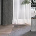 Elegant Dark Gray Curtains With White Sheer By Window And Green Plant Gray Sculpture