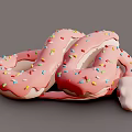 Cute Pink Donut Shaped Snake Covered With Colorful Sprinkles on Gray Background